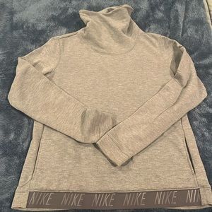 Nike women’s gray turtleneck sweatshirt. And great condition. Size medium.
